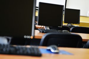 brand new computer with tft monitor in modern classroom at school